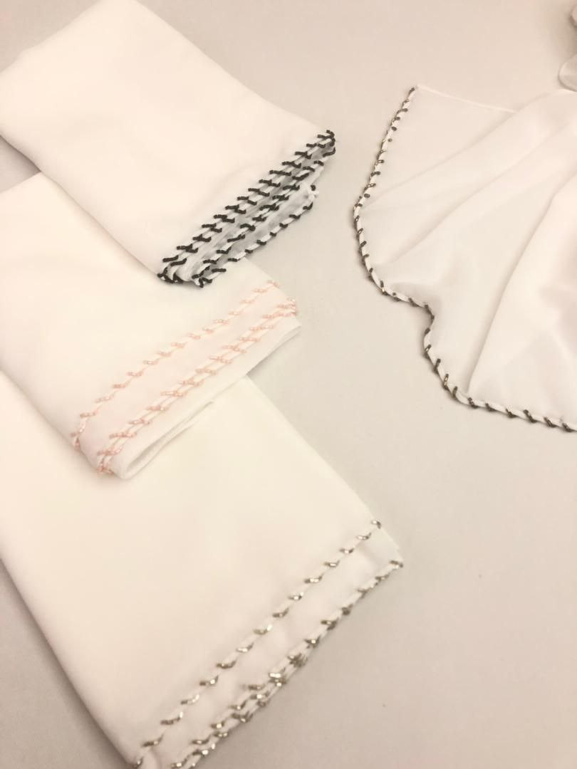 white hijab with colorful embroider