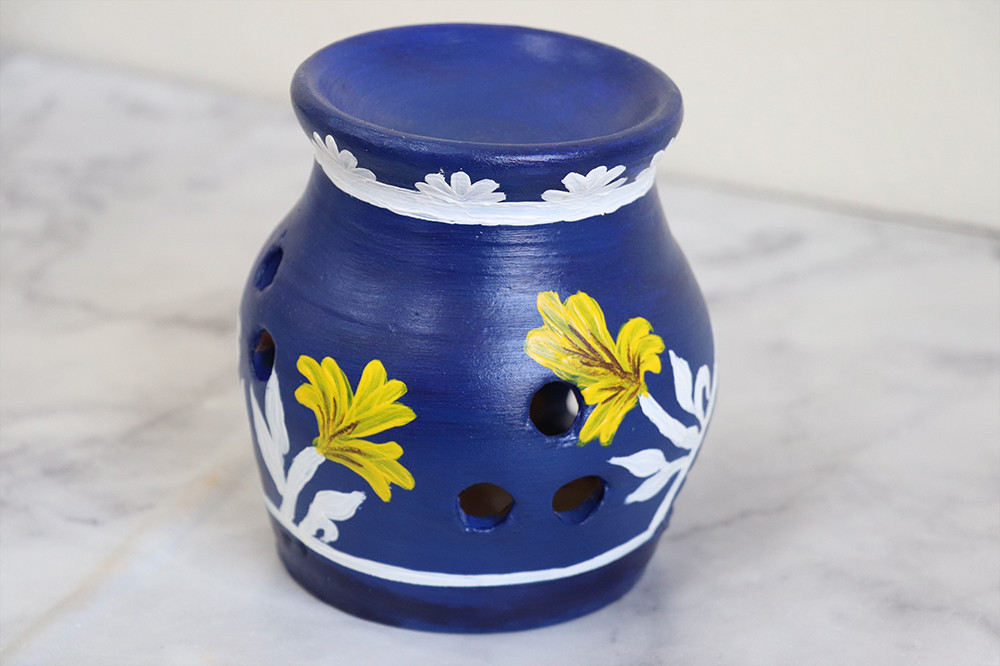 Burners for oil perfumes