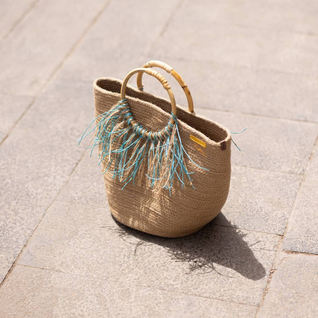 rounded hand handbag